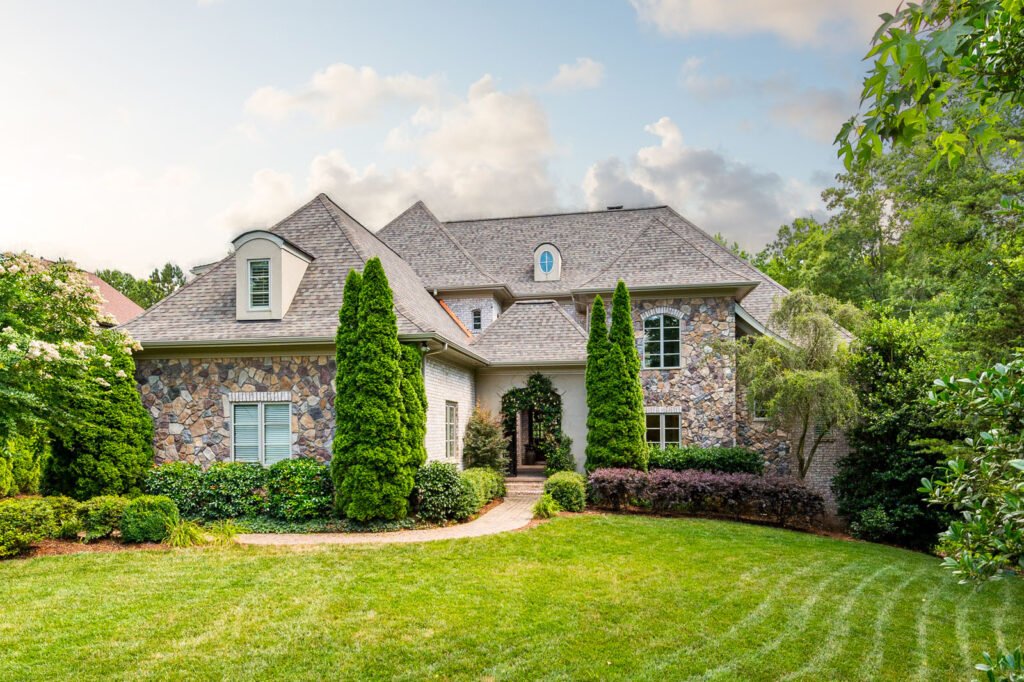 French country stone home photographed in daylight